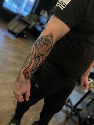 Explore fist bump tattoo ideas, creative tattoo ideas in Peoria, available at Mixed Personalities Tattoo Studio