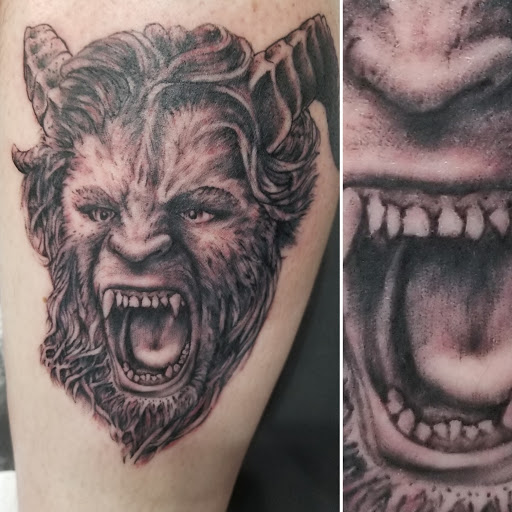 Explore cat tattoo ideas, creative tattoo ideas in Bloomington, available at Crimson Breed Tattoo Studio