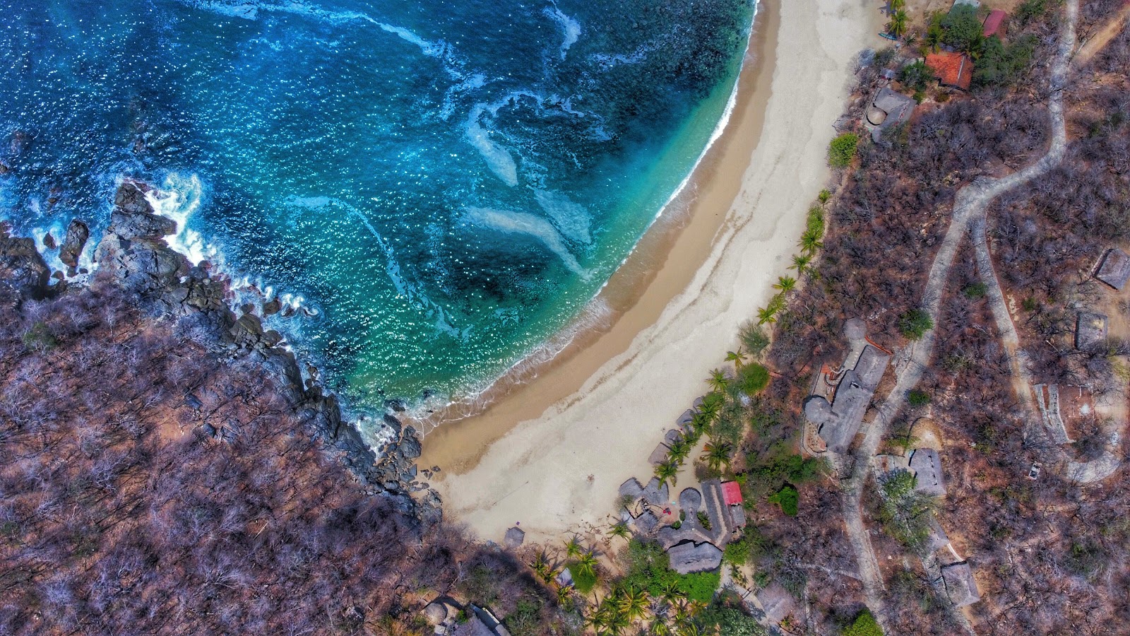 Foto di Playa La Boquilla circondato da montagne
