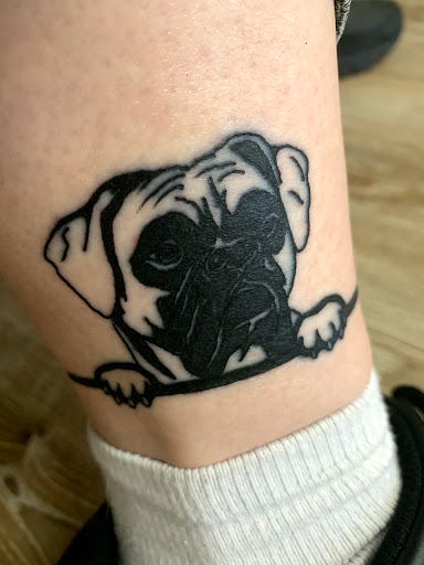 Explore male thigh tattoo ideas, creative tattoo ideas in Knoxville, available at Archangel Custom Ink Tattoo & Piercing