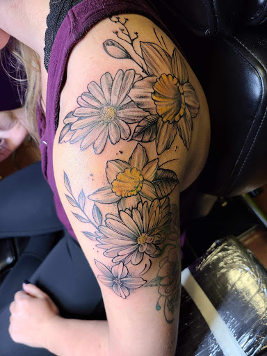 Explore lower back tattoo ideas, creative tattoo ideas in Palm Coast, available at Elite Custom Tattooing