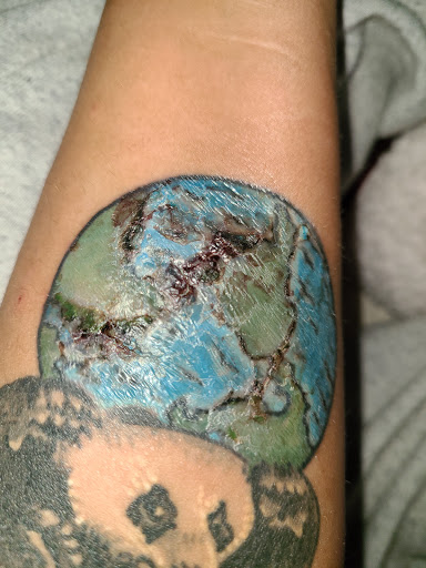 Tattoo Shop «Grimms Tattoo», reviews and photos, 3915 Broadway, Kansas City, MO 64111, USA