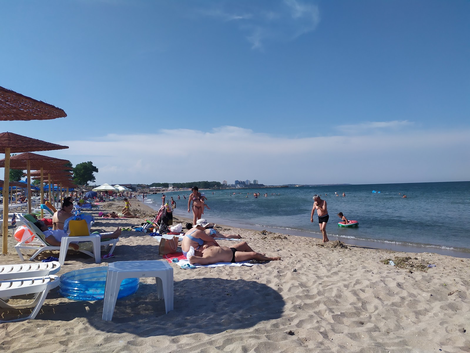 Foto de Playa de Júpiter con arena beige superficie