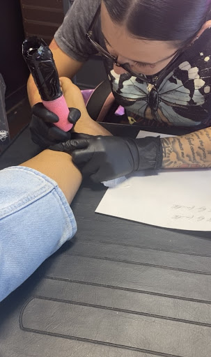 Explore red and black tattoo ideas, creative tattoo ideas in Stuart, available at Kenny Tats Inkcorporated