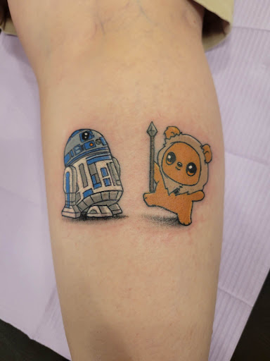 Explore under chin tattoo ideas, creative tattoo ideas in Canon City, available at Tattoos By Richie Streate