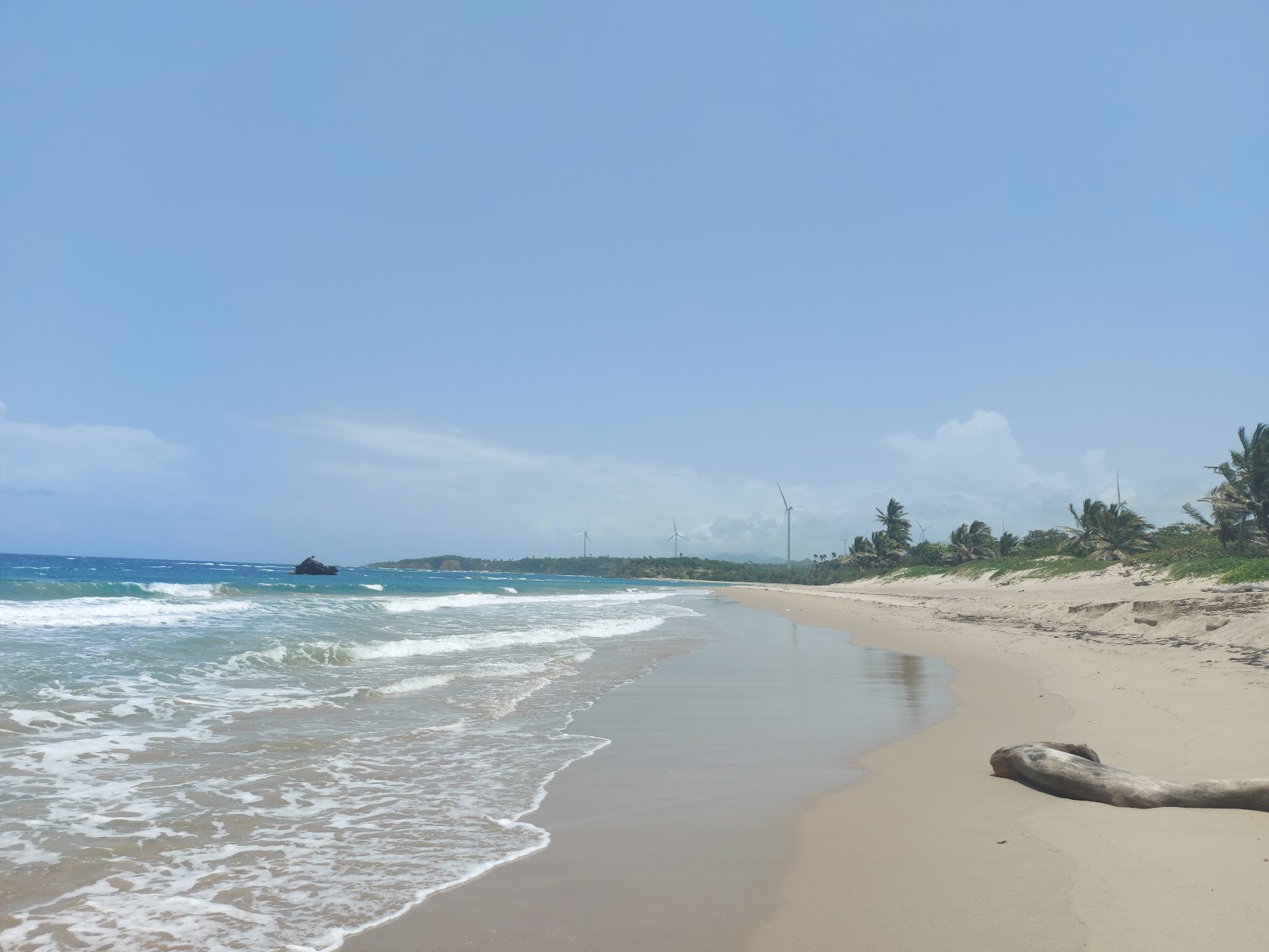 Fotografija Playa Guzmancito z dolga ravna obala