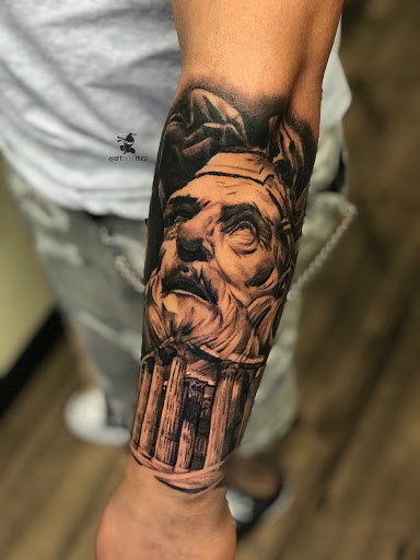 Find cat tattoo ideas simple for your next unique tattoo in Atlanta at Golden Anchor Tattoo