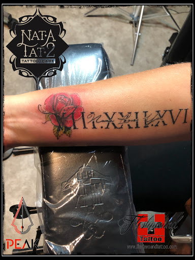 Explore red and black tattoo ideas, creative tattoo ideas in Moweaqua, available at Fleshwound Tattoo