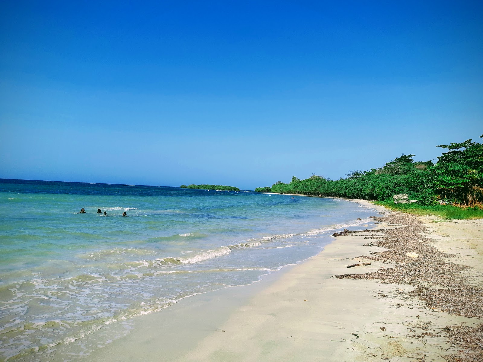 Fotografie cu Fantasy Beach cu o suprafață de nisip strălucitor