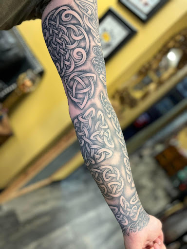 Explore tattoo ideas for crosses, creative tattoo ideas in Warner Robins, available at Untold Pain Tattoo Studio