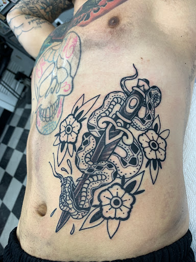 Explore thigh tattoo ideas male, creative tattoo ideas in Cranston, available at TomButts Tattoo LLC