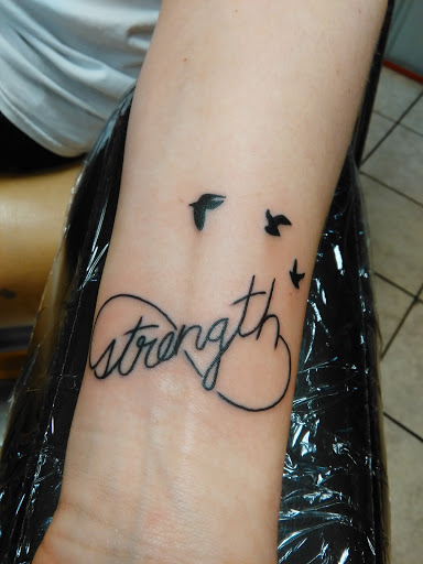 Tattoo Shop «Merritt Tattoos», reviews and photos, 218 N Main St, London, KY 40741, USA