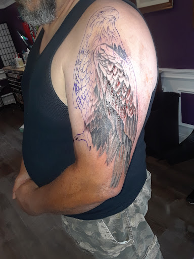 Find armband tattoo ideas for your next unique tattoo in Milford at Valkyrie Studios