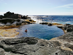 Foto von Caneiros Beach und die siedlung