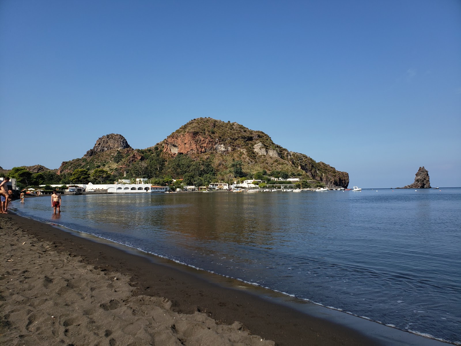 Photo of Black Sands beach with spacious bay