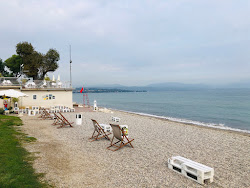 Spiaggia Cala de Or'in fotoğrafı - rahatlamayı sevenler arasında popüler bir yer