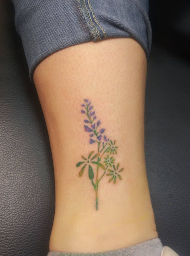 Explore mom name tattoo ideas, creative tattoo ideas in Decatur, available at Exclusive Ink Tattoos & Body Piercings 22nd & Wood