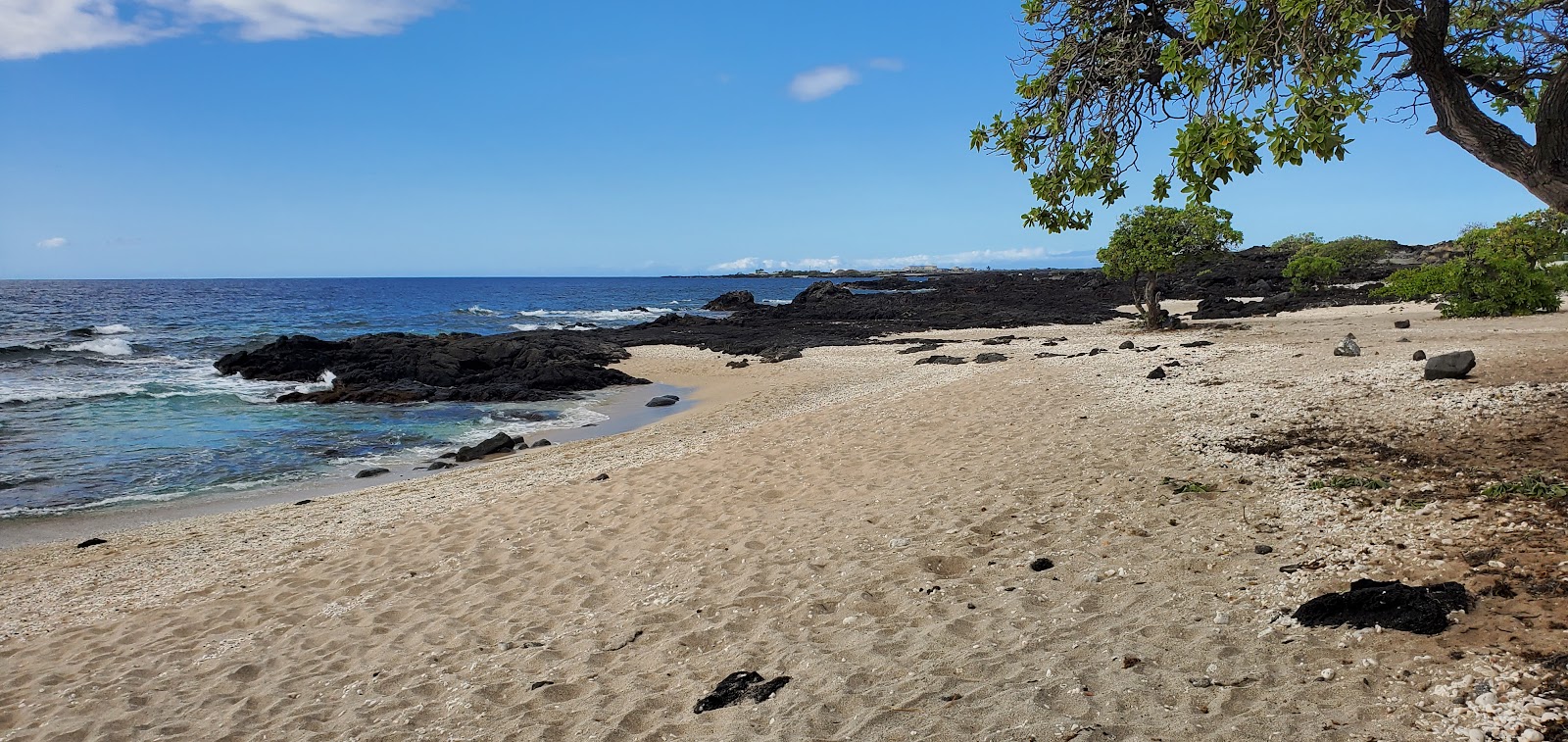 Foto de O'oma Beach localizado em área natural