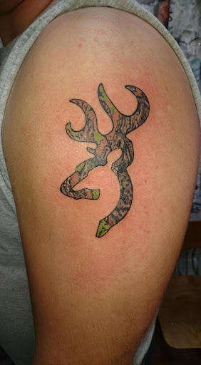 Explore tricep tattoo ideas for men, creative tattoo ideas in Jonesboro, available at Immortal Ink