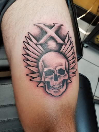 Explore snake tattoo ideas for females, creative tattoo ideas in Indianapolis, available at Sovereignty Tattoo