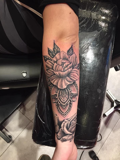 Explore sleeve mens tattoo ideas, creative tattoo ideas in Great Falls, available at Alpha Tattoos & Piercings