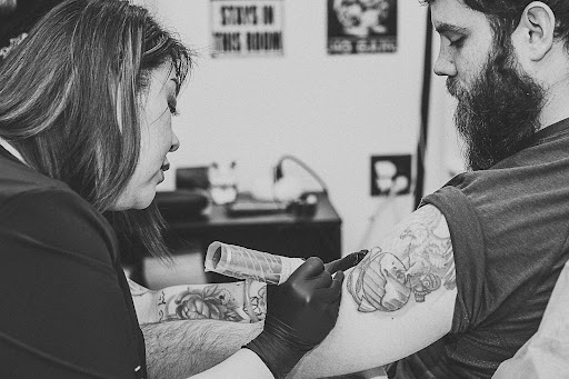 Explore manatee tattoo ideas, creative tattoo ideas in Sioux City, available at Inkspired Atelier