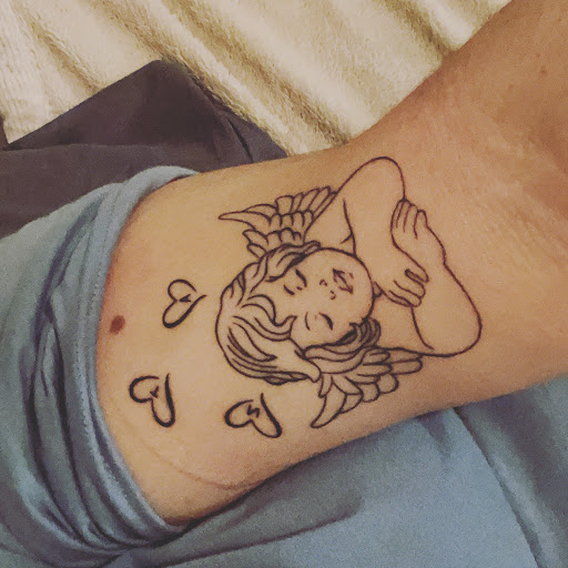 Explore biblical tattoo ideas for men, creative tattoo ideas in Mandan, available at Dolls Studios Tattoo & Piercing