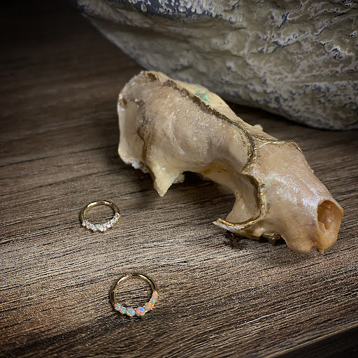 Explore wedding ring tattoo cover up ideas, creative tattoo ideas in Cary, available at Fine Art Body Piercing By Lilith Mae