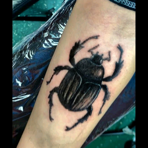 Explore george strait tattoo ideas, creative tattoo ideas in Vancouver, available at Studio X Tattoos & Piercings