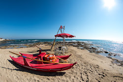 Foto von Lido Bianco beach mit viele kleine buchten