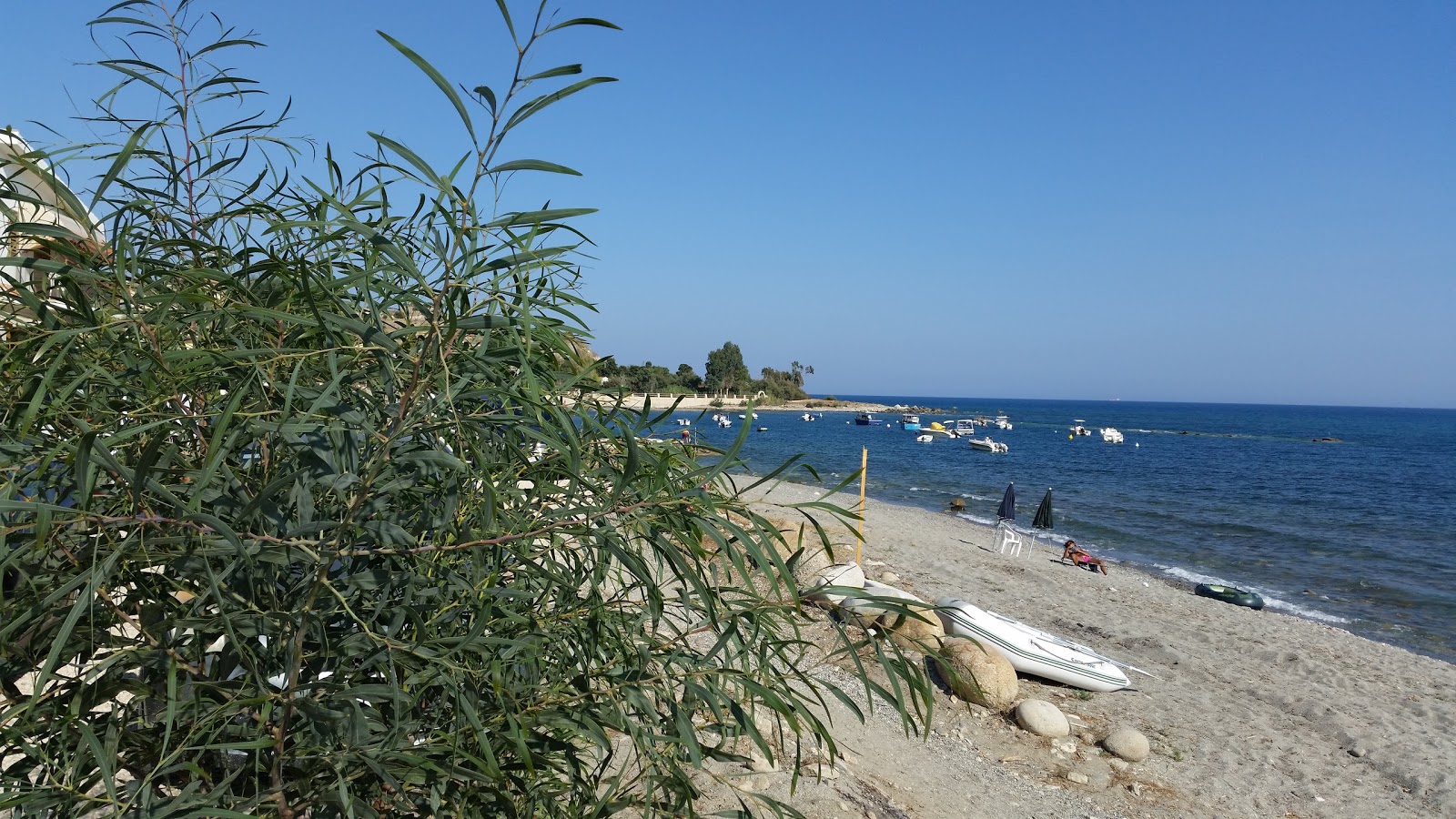 Fotografie cu Spiaggia di Stracìa cu nivelul de curățenie înalt