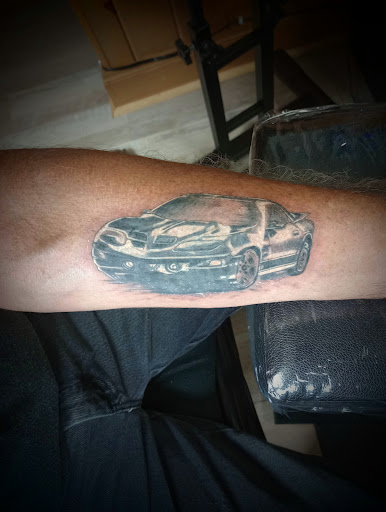 Explore heart tattoo ideas with names, creative tattoo ideas in Clintonville, available at Temple Ink Tattoo Shop