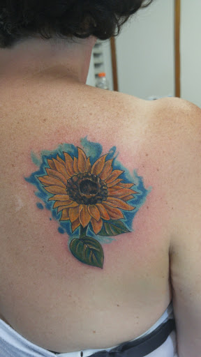 Explore wisconsin tattoo ideas, creative tattoo ideas in Sioux City, available at Living Art Tattoo Studio