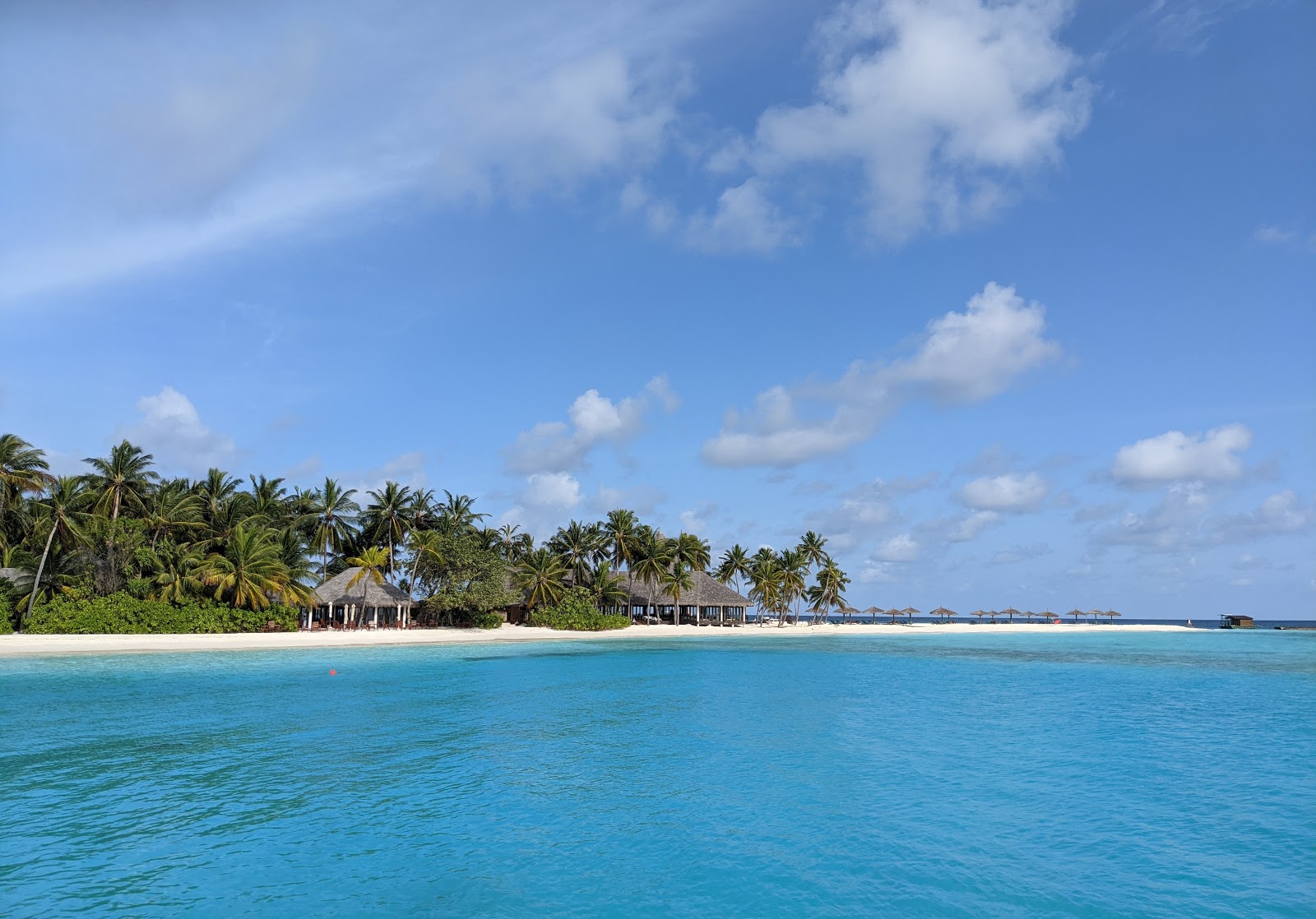 Foto van Veligandu Island Resort met turquoise puur water oppervlakte