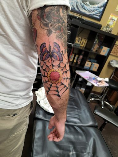 Explore gangster tattoo ideas for men, creative tattoo ideas in Fort Worth, available at Royal 1 Tattoos