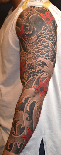 Explore fallen angel tattoo ideas, creative tattoo ideas in Green Bay, available at Katana Tattoo