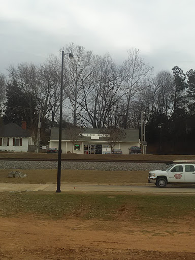 Grocery Store «Tote-A-Poke Food Store», reviews and photos, 565 E Main St, Buford, GA 30518, USA