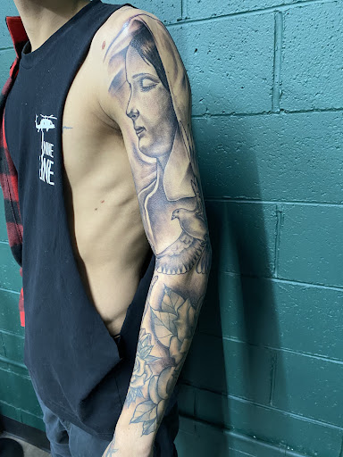 Explore tramp tattoo ideas, creative tattoo ideas in Richland, available at The Green Room Tattoo Lounge