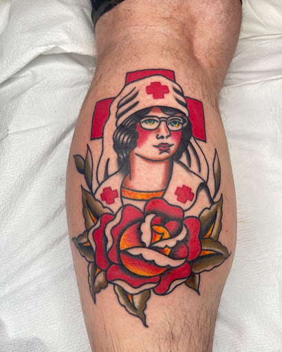 Explore african warrior tattoo ideas, creative tattoo ideas in Johnson City, available at Gold Cross Tattoo Co.