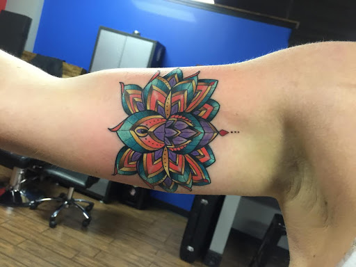 Explore fox racing tattoo ideas, creative tattoo ideas in Linden, available at Fredricks Tattoo Gallery