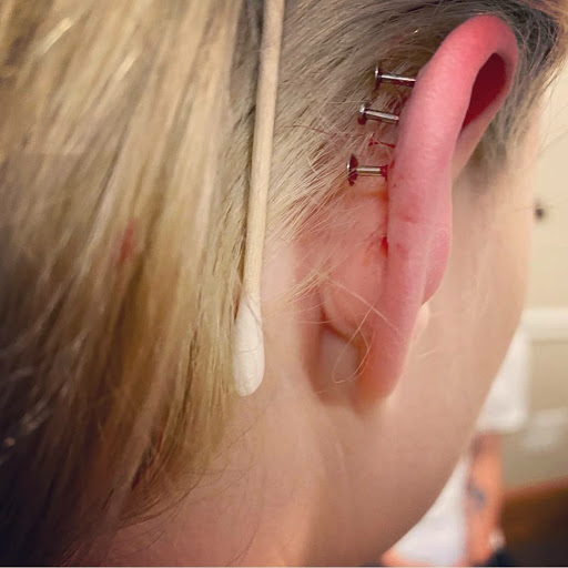 Explore wedding band tattoo ideas for him, creative tattoo ideas in Charleston, available at Exotic Impressions Body Piercing