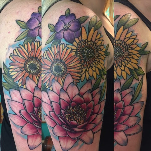 Explore mens behind ear tattoo ideas, creative tattoo ideas in Kansas City, available at Golden Stag Tattoo and Gallery