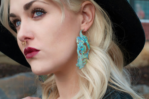 Explore black hole tattoo ideas, creative tattoo ideas in Spokane, available at Moms Custom Tattoo & Body Piercing