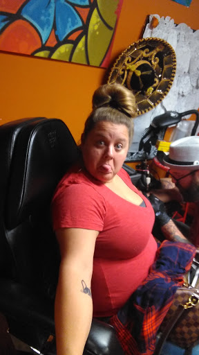 Explore comic book tattoo ideas, creative tattoo ideas in Toledo, available at Brass Monkey Tattoo Co