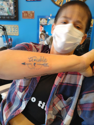 Explore tattoo ideas beach theme, creative tattoo ideas in Independence, available at Time Machine Tattoo