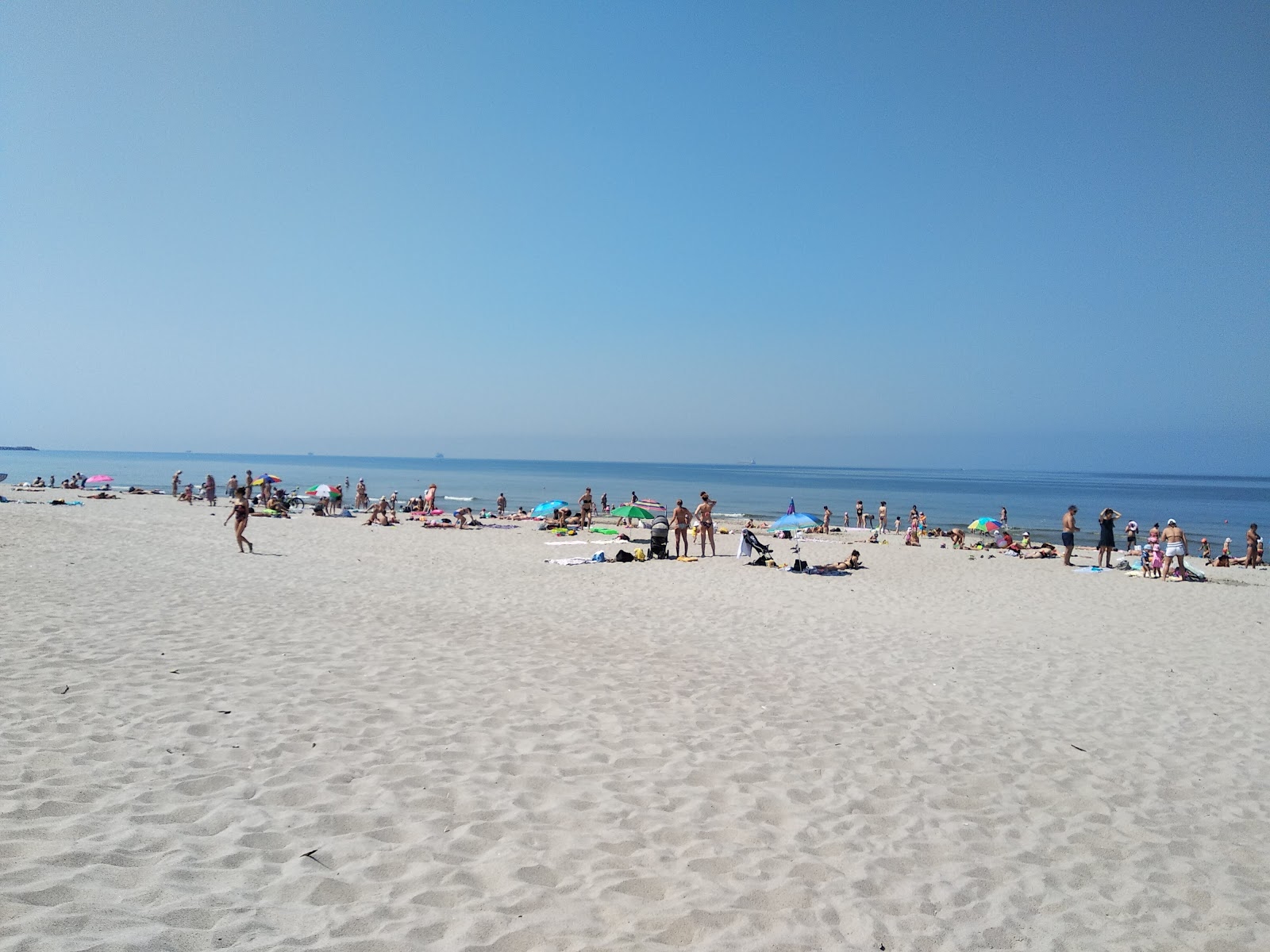 Foto von Gorodskoy plaj Baltiyska mit heller sand Oberfläche