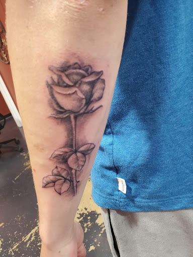 Explore trust no one tattoo ideas, creative tattoo ideas in Pineville, available at Epic Ink Studio