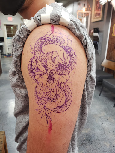 Find background tattoo ideas for guys for your next unique tattoo in Rockford at Delicious Ink Tattoo & Piercing
