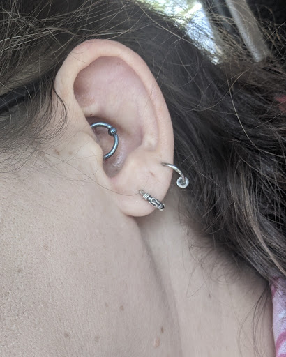 Explore kiss lip tattoo ideas, creative tattoo ideas in Savannah, available at Planet 3 Piercing