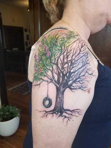 Explore graduation tattoo ideas, creative tattoo ideas in Canton, available at The Inkeepers Tattoo Parlor